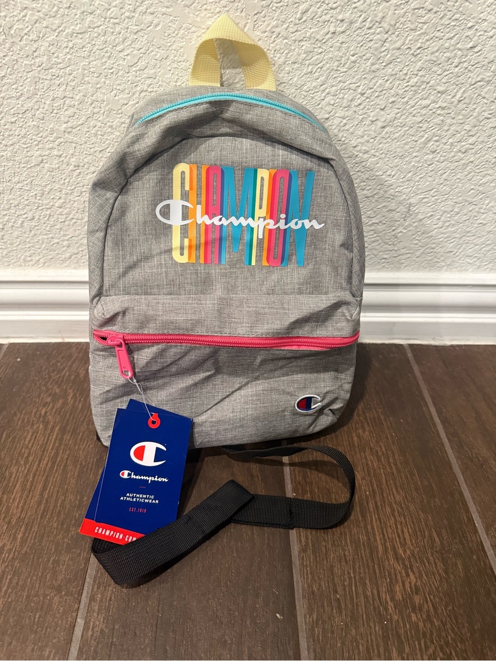 Champion Gray Mini Backpack with Multicolor Logo and Pink Accent